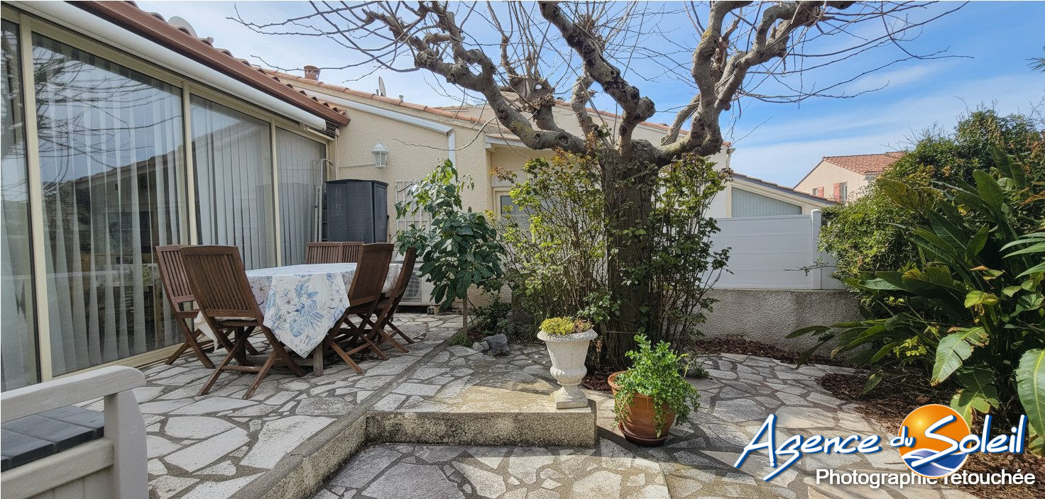 Photo de GRAND PAVILLON D'ANGLE AVEC JARDIN